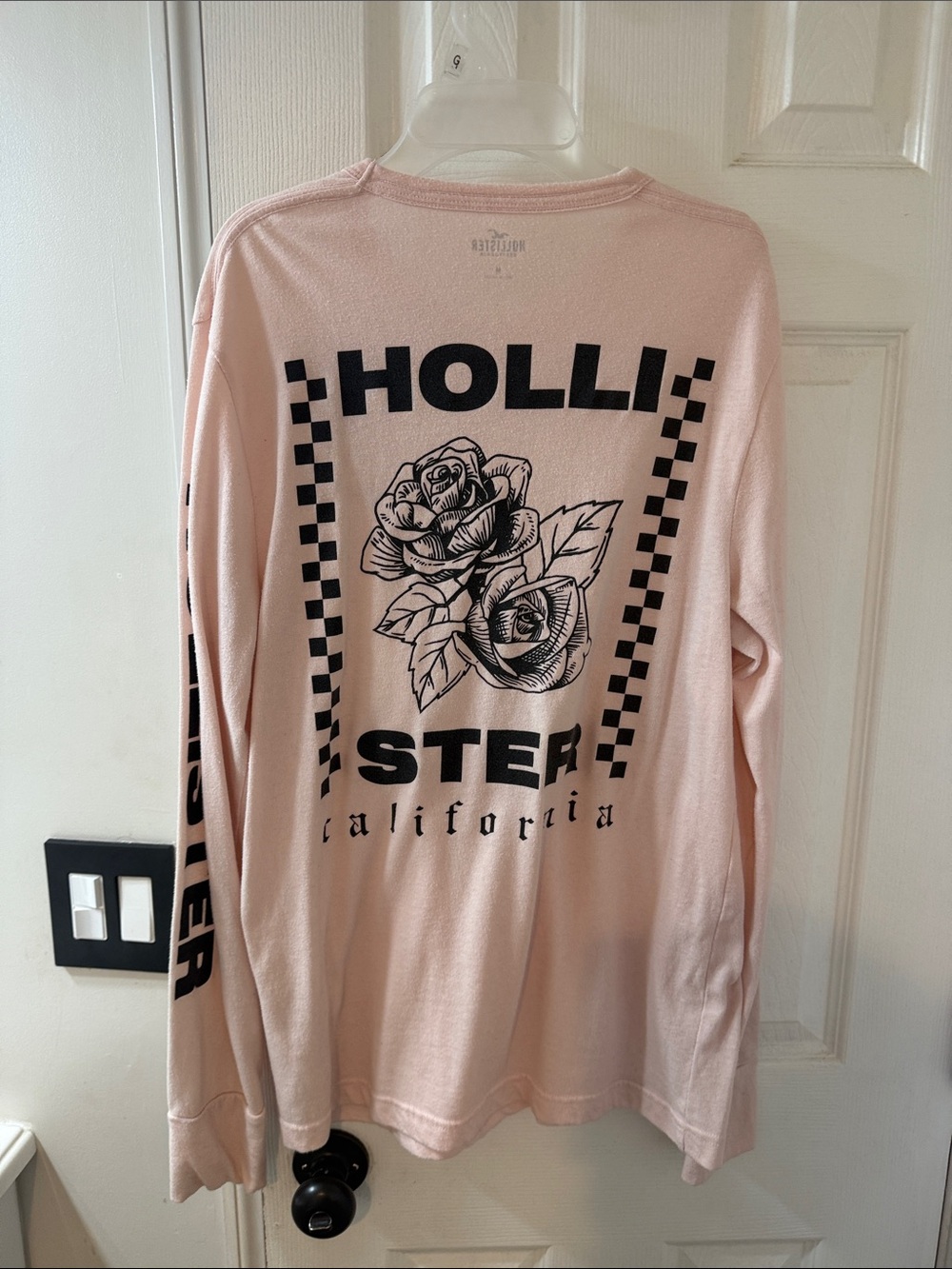 Hollister Long-Sleeve Graphic Tee in Light Pink with Black Print